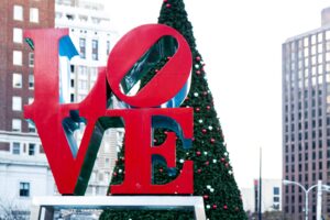 a christmas tree in front of a building